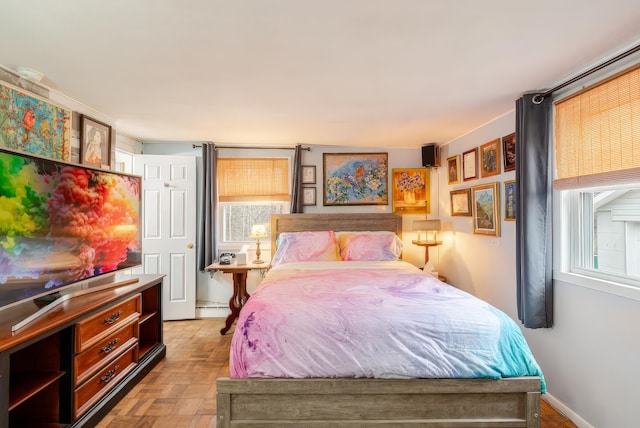bedroom featuring a baseboard radiator
