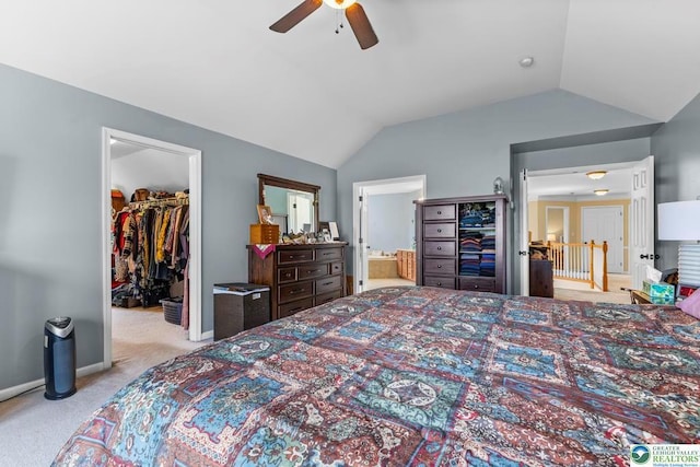 140 Birdie Way, Kunkletown, PA 18058 - bedroom featuring a spacious closet, carpet flooring, lofted ceiling, connected bathroom, and ceiling fan