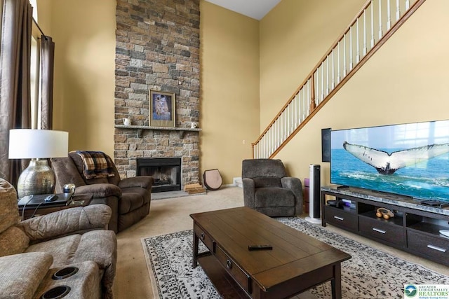140 Birdie Way, Kunkletown, PA 18058 - living area with carpet, a stone fireplace, and a high ceiling
