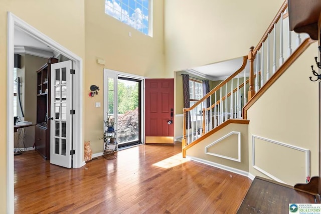 140 Birdie Way, Kunkletown, PA 18058 - entryway featuring hardwood / wood-style floors, stairs, plenty of natural light, and a high ceiling
