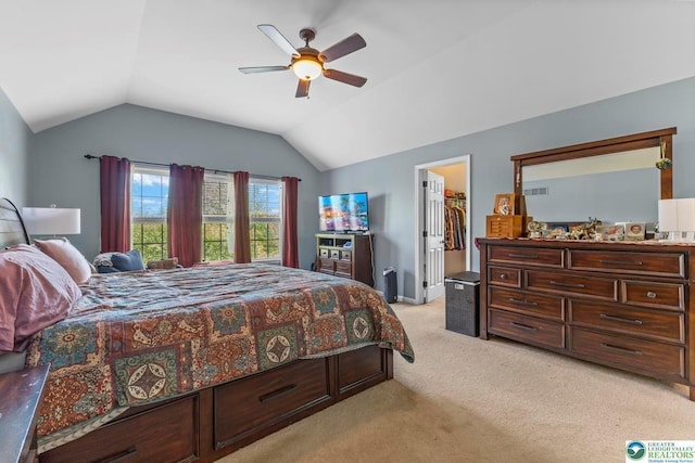 140 Birdie Way, Kunkletown, PA 18058 - bedroom with light carpet, vaulted ceiling, a walk in closet, a ceiling fan, and a closet