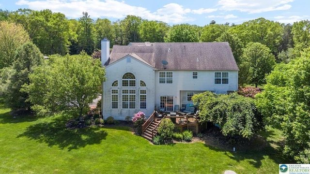 140 Birdie Way, Kunkletown, PA 18058 - rear view of property featuring a wooden deck, a yard, and a chimney