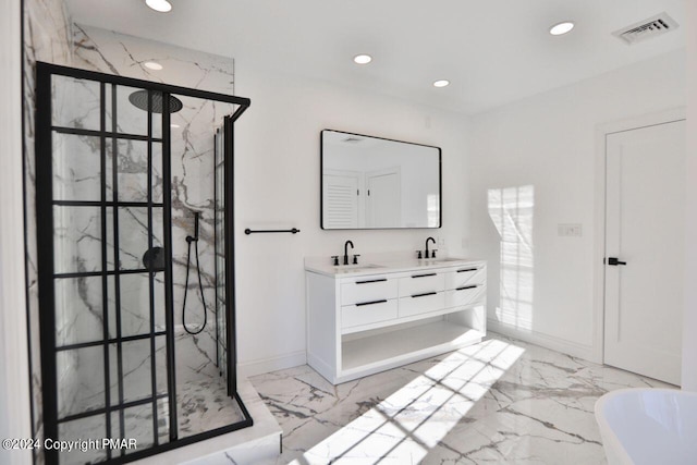 bathroom with marble finish floor, visible vents, a sink, and a marble finish shower