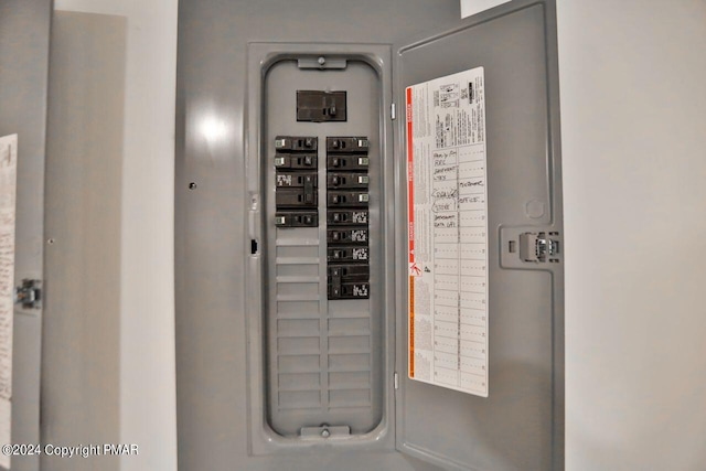 utility room featuring electric panel