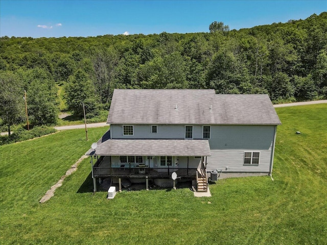 169 Roberts Rd, Starlight, PA 18461 - back of property featuring a view of trees and a yard
