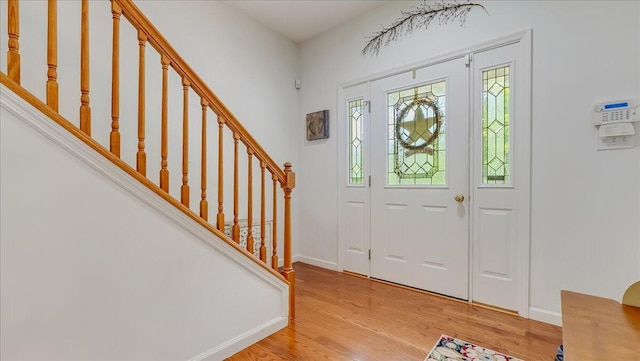 169 Roberts Rd, Starlight, PA 18461 - foyer with light wood finished floors and stairway