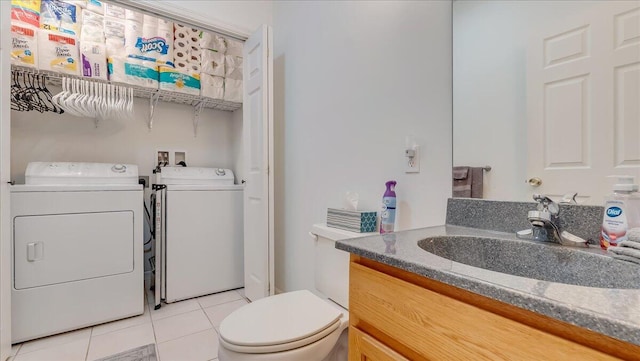 169 Roberts Rd, Starlight, PA 18461 - bathroom featuring washer and dryer, vanity, and tile patterned flooring