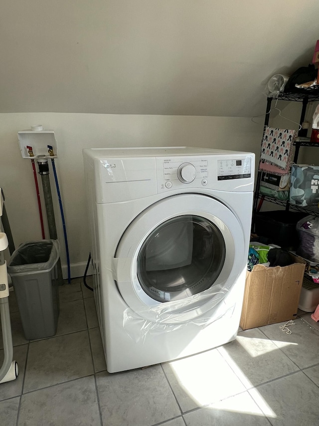 108 Devils Hole Rd, Cresco, PA 18326 - clothes washing area with light tile patterned flooring, laundry area, and washer / clothes dryer