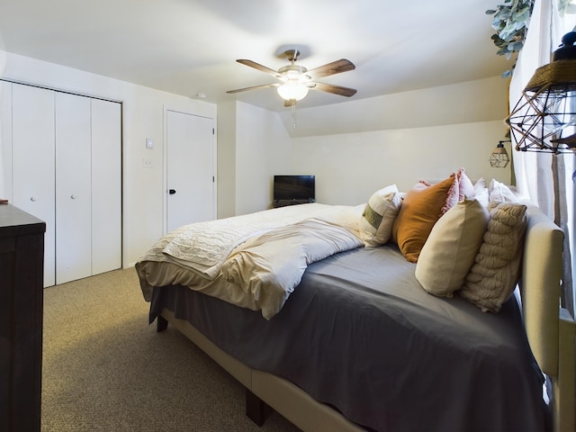 bedroom with ceiling fan, a closet, and carpet