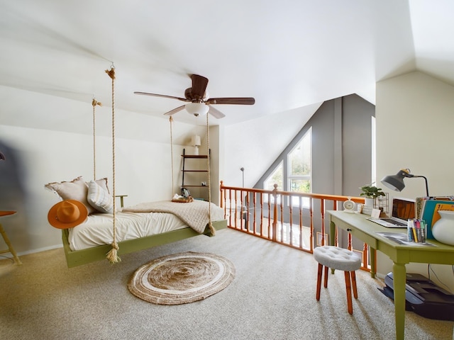 bedroom featuring carpet and vaulted ceiling