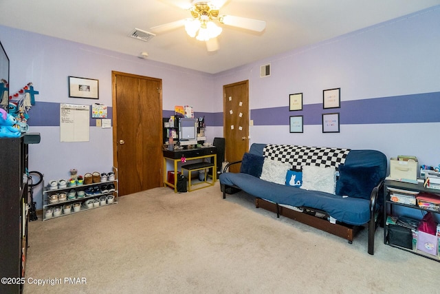 interior space with ceiling fan