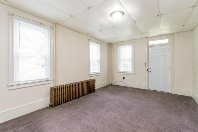 266 Laurel Rd, Lehighton, PA 18235 - foyer entrance with radiator heating unit, carpet floors, and a drop ceiling