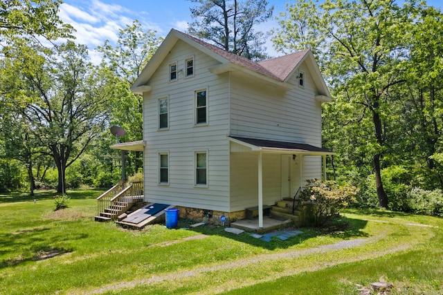 266 Laurel Rd, Lehighton, PA 18235 - back of property with a yard and roof with shingles