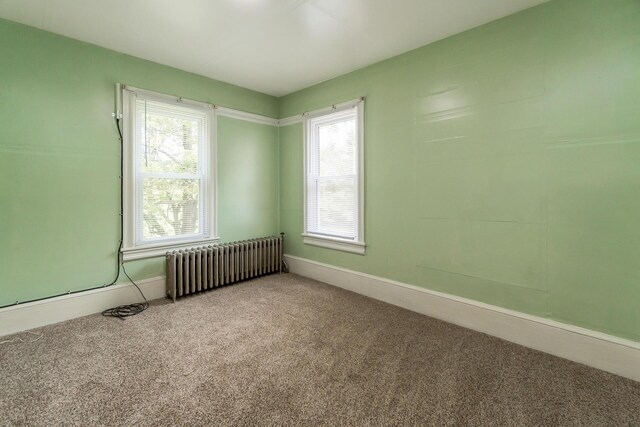 266 Laurel Rd, Lehighton, PA 18235 - spare room featuring radiator and carpet