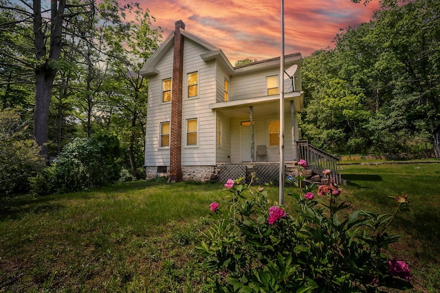 266 Laurel Rd, Lehighton, PA 18235 - view of front facade with a porch, a chimney, and a front yard