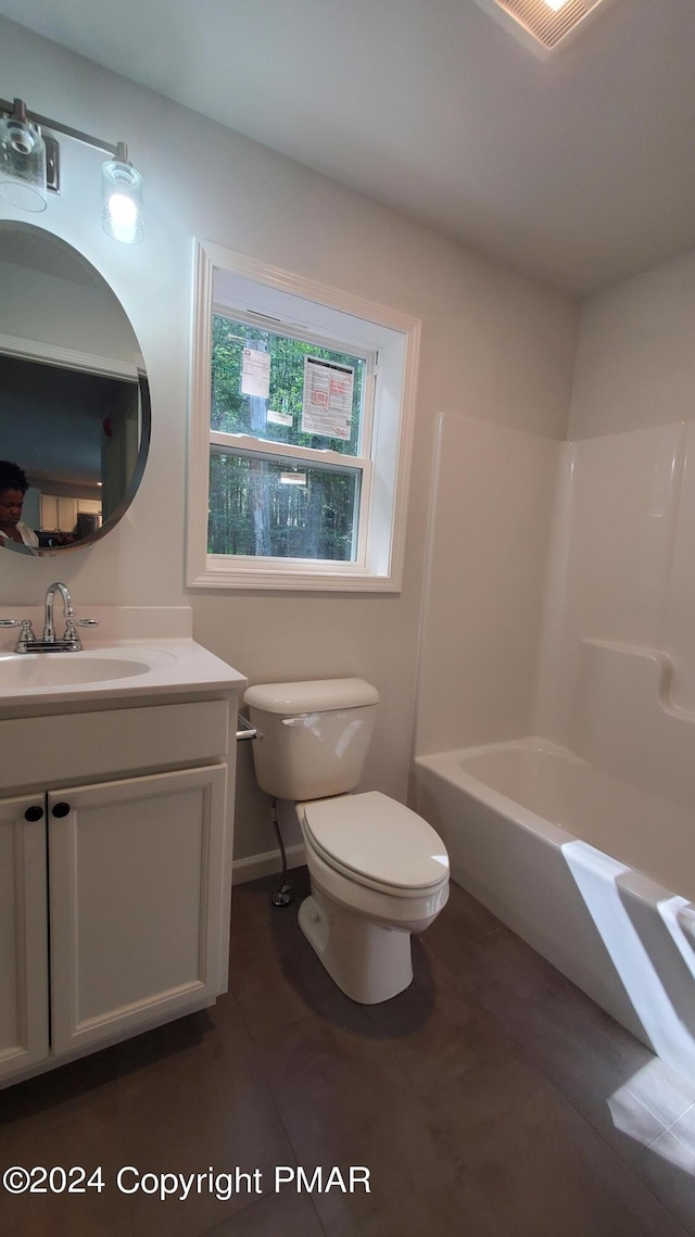 full bathroom featuring toilet and vanity