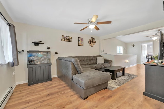 24 W Garibaldi Ave, Nesquehoning, PA 18240 - living area featuring baseboards, ceiling fan, baseboard heating, and light wood-style flooring