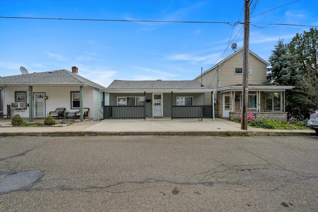 24 W Garibaldi Ave, Nesquehoning, PA 18240 - traditional home with cooling unit and a porch