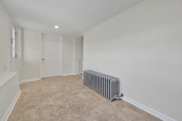 24 W Garibaldi Ave, Nesquehoning, PA 18240 - unfurnished room featuring radiator, baseboards, and recessed lighting
