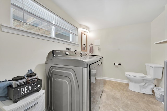 24 W Garibaldi Ave, Nesquehoning, PA 18240 - half bathroom with baseboards, washer and clothes dryer, toilet, and vanity