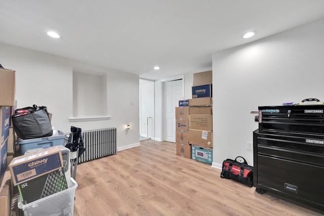 24 W Garibaldi Ave, Nesquehoning, PA 18240 - interior space with baseboards, recessed lighting, radiator, and wood finished floors