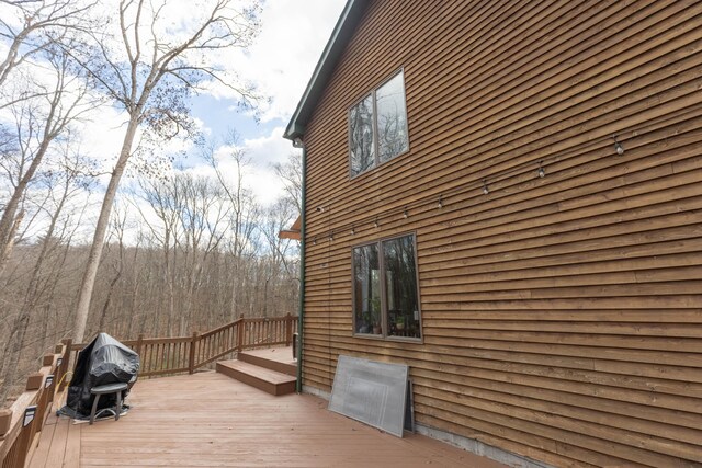 wooden deck with area for grilling