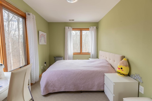 bedroom with visible vents