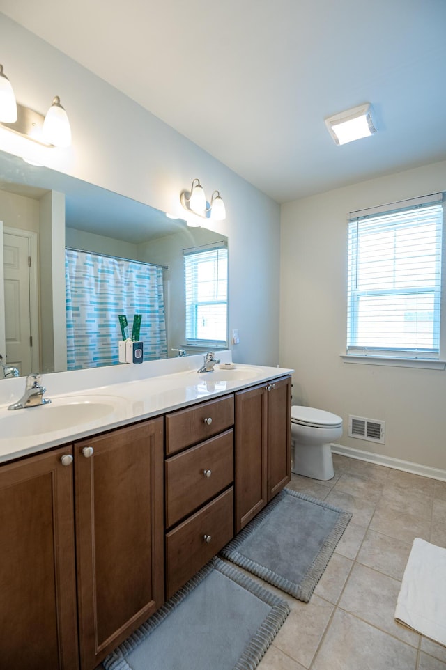 320 Bendelow Ln, Northampton, PA 18067 - bathroom featuring double vanity, tile patterned flooring, and curtained shower