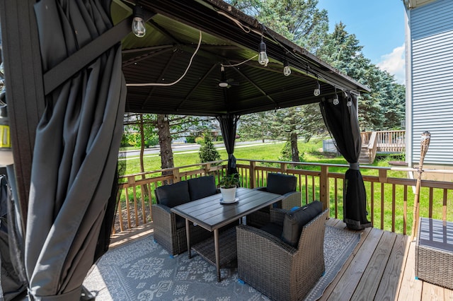 320 Bendelow Ln, Northampton, PA 18067 - wooden deck with a gazebo, outdoor dining space, and a lawn