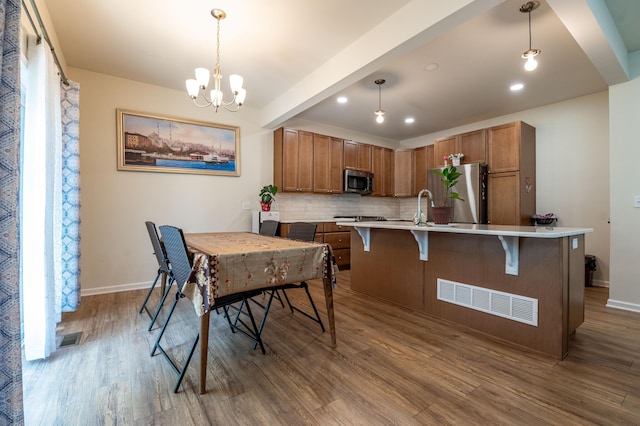 320 Bendelow Ln, Northampton, PA 18067 - dining room with dark wood-style flooring, a chandelier, recessed lighting, and beam ceiling
