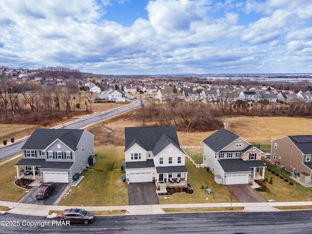 drone / aerial view with a residential view