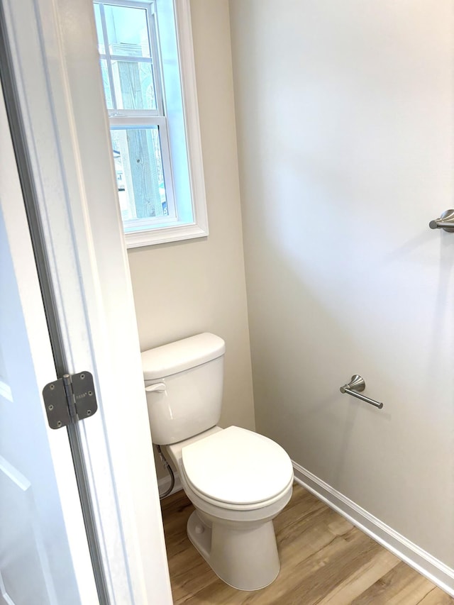 247 Sandlewood Dr, East Stroudsburg, PA 18301 - bathroom with baseboards, wood finished floors, and toilet