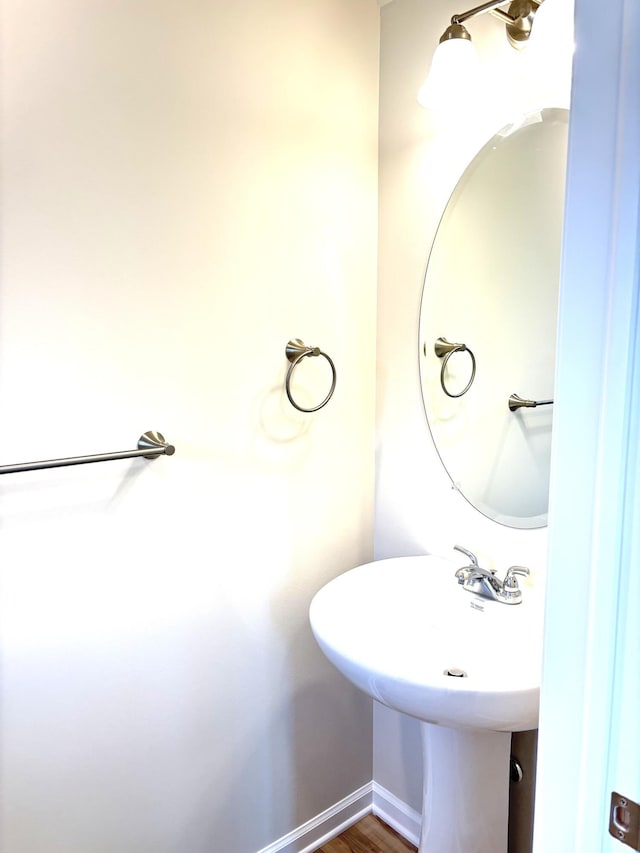 247 Sandlewood Dr, East Stroudsburg, PA 18301 - bathroom featuring baseboards and wood finished floors