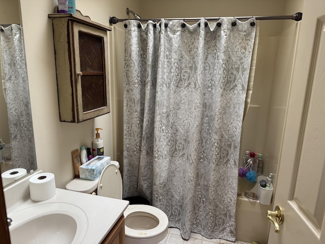 bathroom featuring a shower with shower curtain, toilet, and vanity