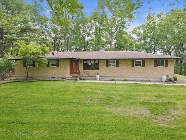 3106 Janet St, East Stroudsburg, PA 18301 - ranch-style home with brick siding, a front lawn, and entry steps