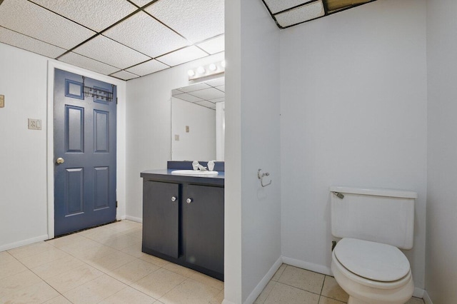 3106 Janet St, East Stroudsburg, PA 18301 - bathroom with vanity, toilet, tile patterned floors, baseboards, and a drop ceiling