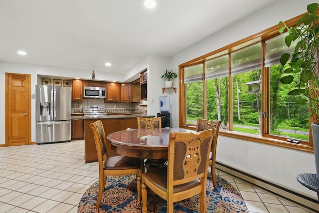 3106 Janet St, East Stroudsburg, PA 18301 - dining area featuring a baseboard radiator, light tile patterned floors, recessed lighting, and baseboards