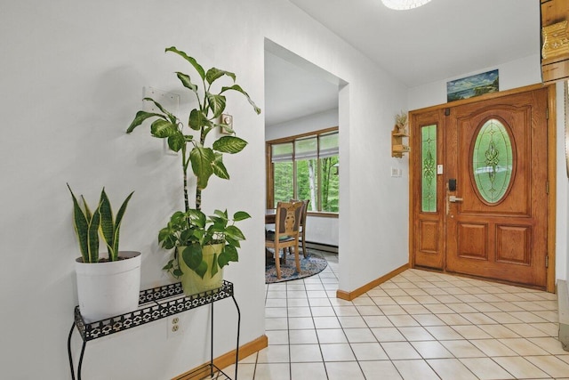 3106 Janet St, East Stroudsburg, PA 18301 - entryway featuring baseboards, light tile patterned floors, and a baseboard radiator