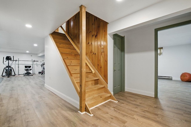 3106 Janet St, East Stroudsburg, PA 18301 - staircase with wood finished floors, baseboard heating, recessed lighting, and baseboards
