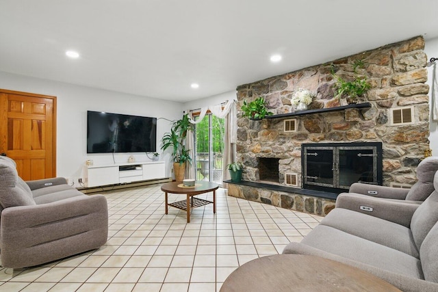 3106 Janet St, East Stroudsburg, PA 18301 - living room featuring light tile patterned floors, a fireplace, and recessed lighting