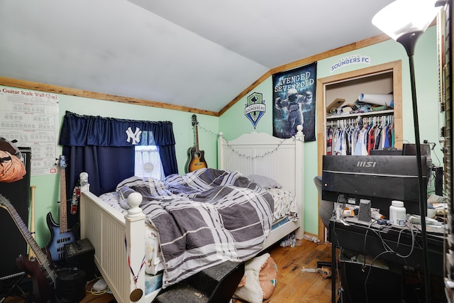 235 Scenic Dr, East Stroudsburg, PA 18302 - bedroom with vaulted ceiling and wood finished floors