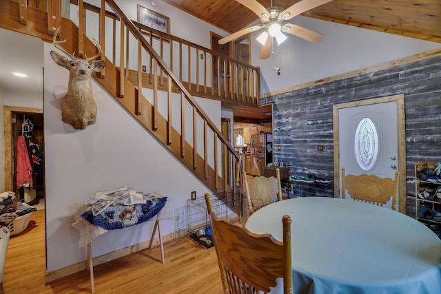 235 Scenic Dr, East Stroudsburg, PA 18302 - dining space featuring ceiling fan, high vaulted ceiling, stairs, wood finished floors, and wooden ceiling