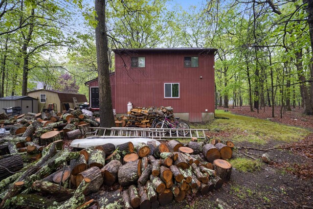235 Scenic Dr, East Stroudsburg, PA 18302 - back of house featuring a shed and an outdoor structure