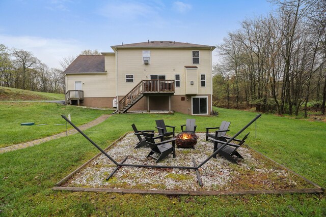 5175 White Birch Dr, Long Pond, PA 18334 - rear view of house with a fire pit, stairs, a wooden deck, and a yard