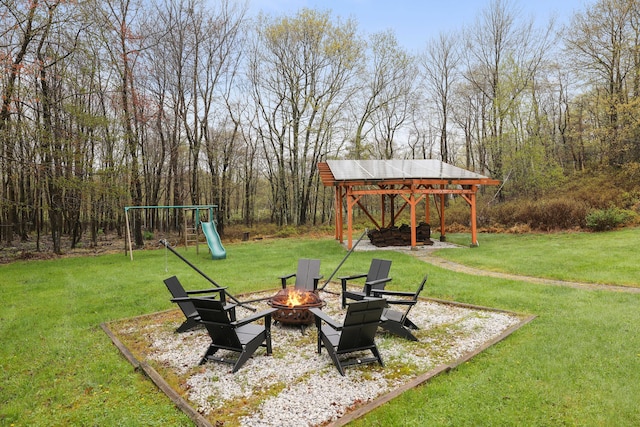 5175 White Birch Dr, Long Pond, PA 18334 - view of green lawn featuring an outdoor fire pit, a gazebo, and a playground