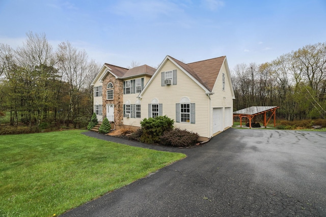 5175 White Birch Dr, Long Pond, PA 18334 - view of front of property with asphalt driveway, a garage, and a front yard