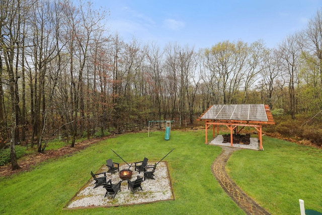 5175 White Birch Dr, Long Pond, PA 18334 - view of grassy yard with an outdoor fire pit and a playground