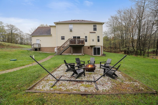 5175 White Birch Dr, Long Pond, PA 18334 - rear view of house with a fire pit, stairs, a wooden deck, and a yard