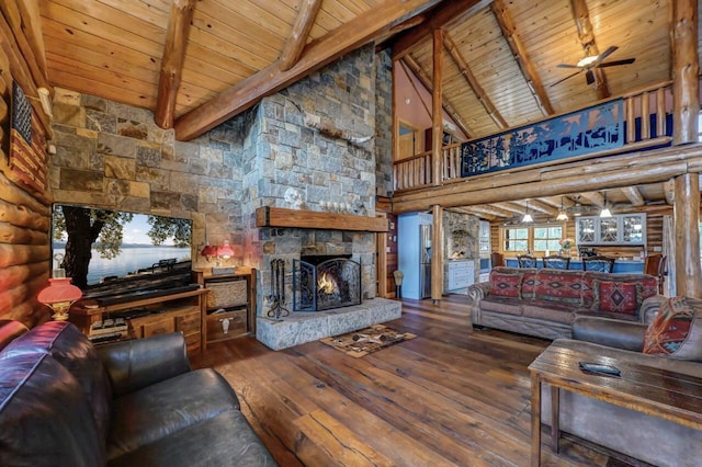living area featuring high vaulted ceiling, beamed ceiling, wood-type flooring, and wooden ceiling