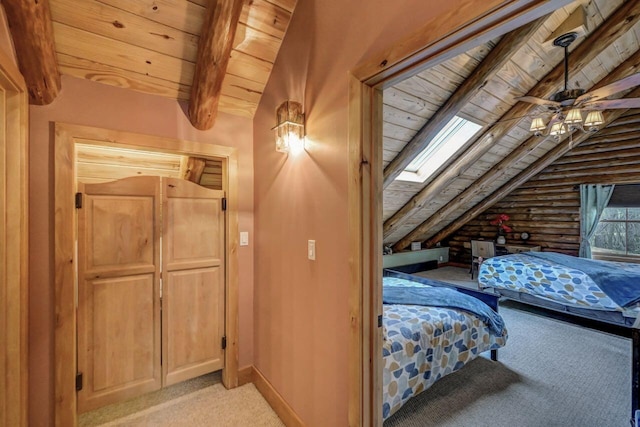 bedroom featuring light carpet, log walls, lofted ceiling with beams, and wood ceiling